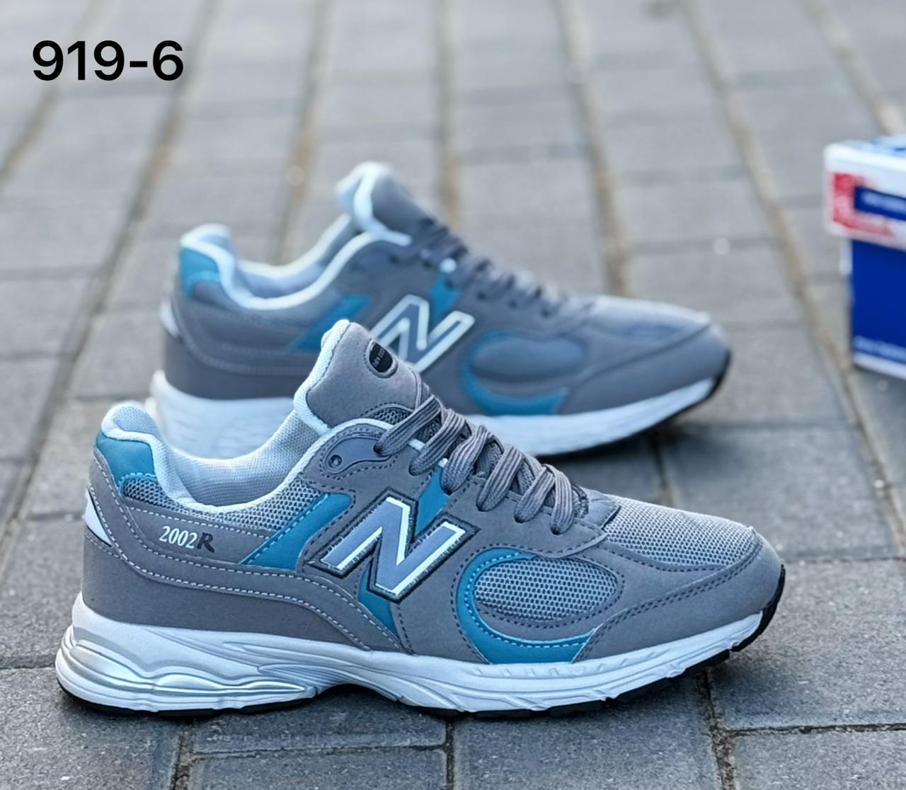 фото мужские кроссовки new balance 2002r серые с синими акцентами 239043 оптом