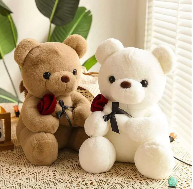 картинка Мягкая игрушка " Мишка с розой" 23 см от магазина Одежда+