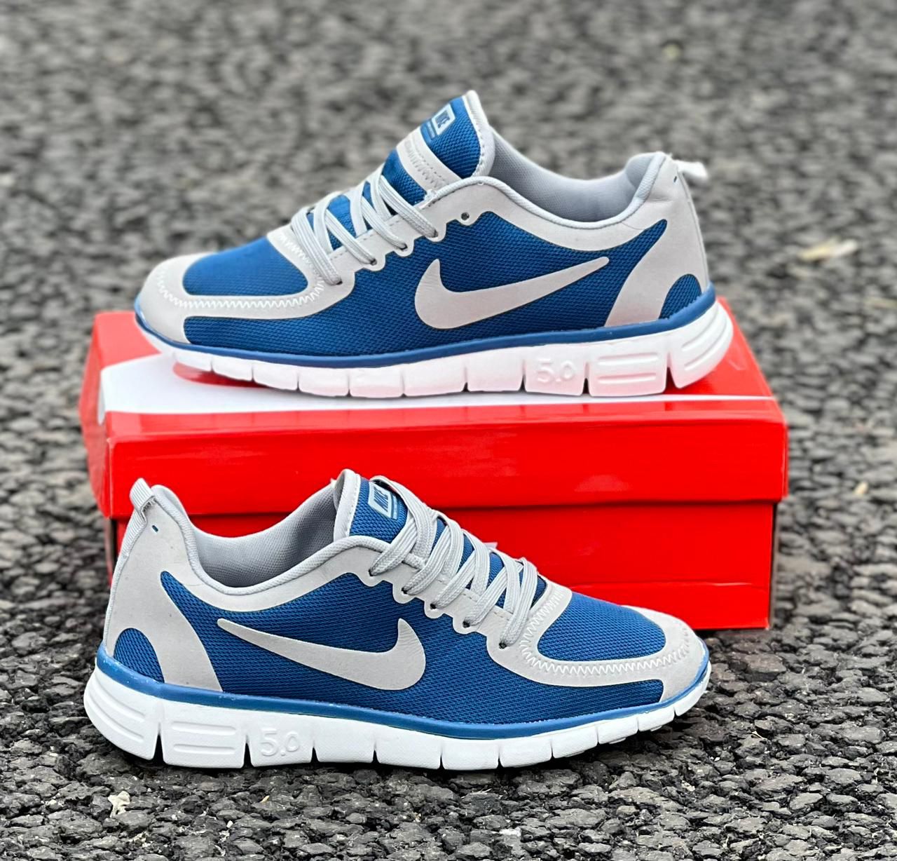 фото Мужские синие кроссовки Nike 556972 оптом с доставкой