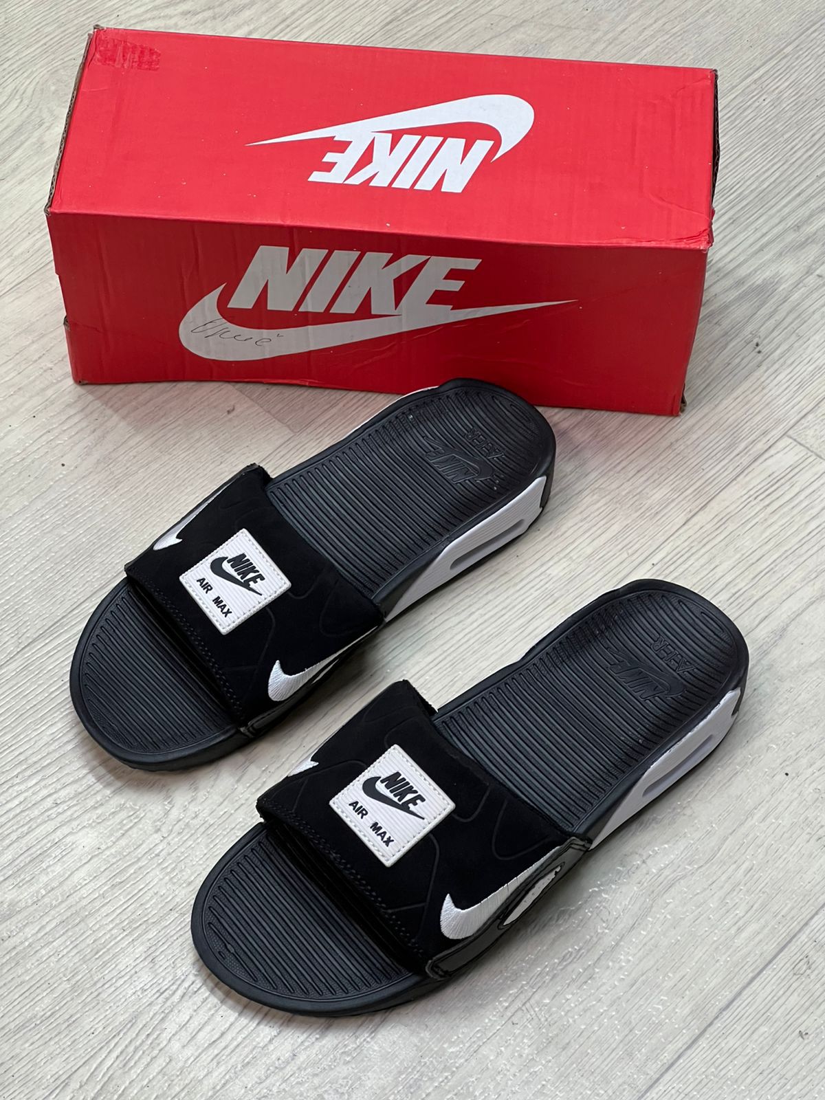 фото Мужские черные слайды Nike 517935 оптом в Москве