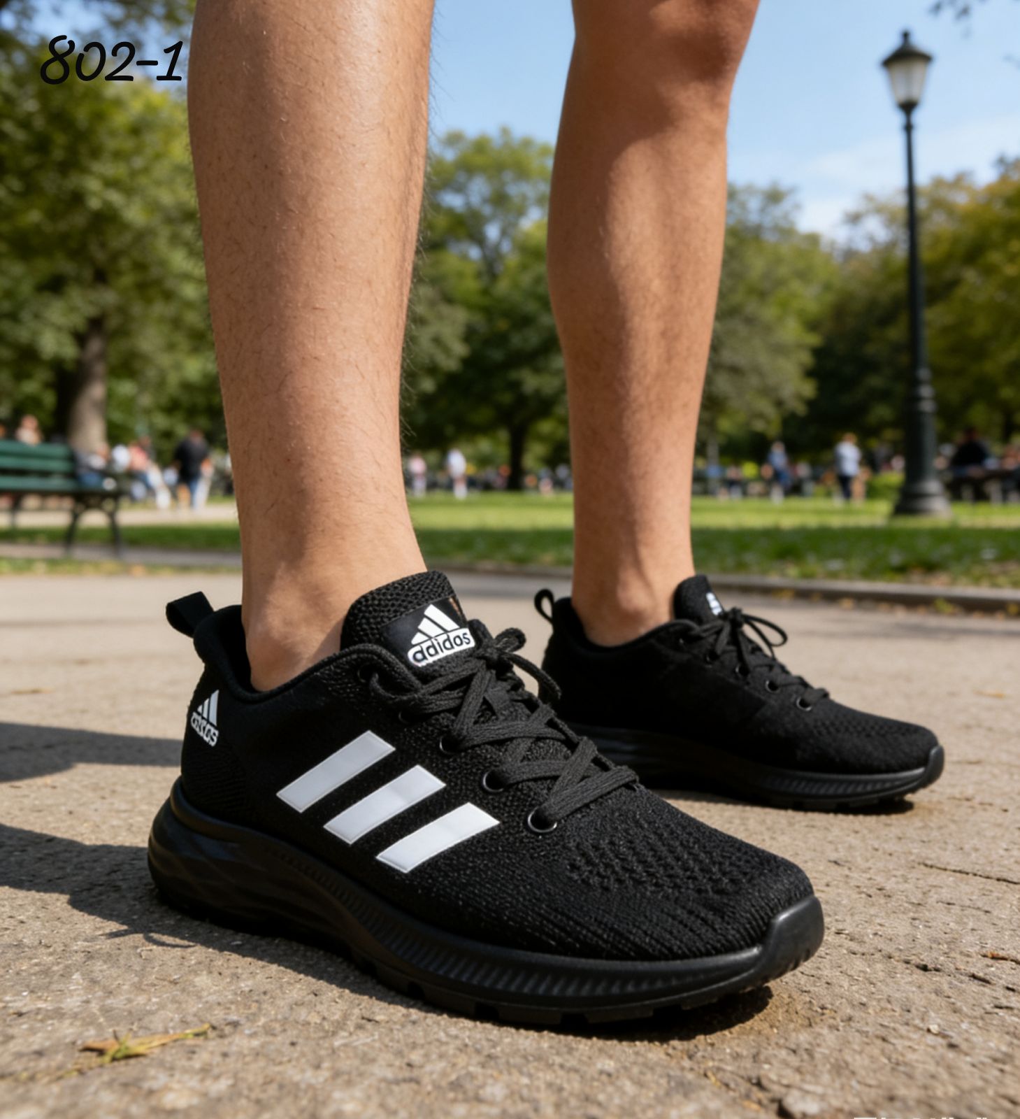 фото Мужские черные кроссовки с белыми полосками 565850 оптом на лето для мужчин