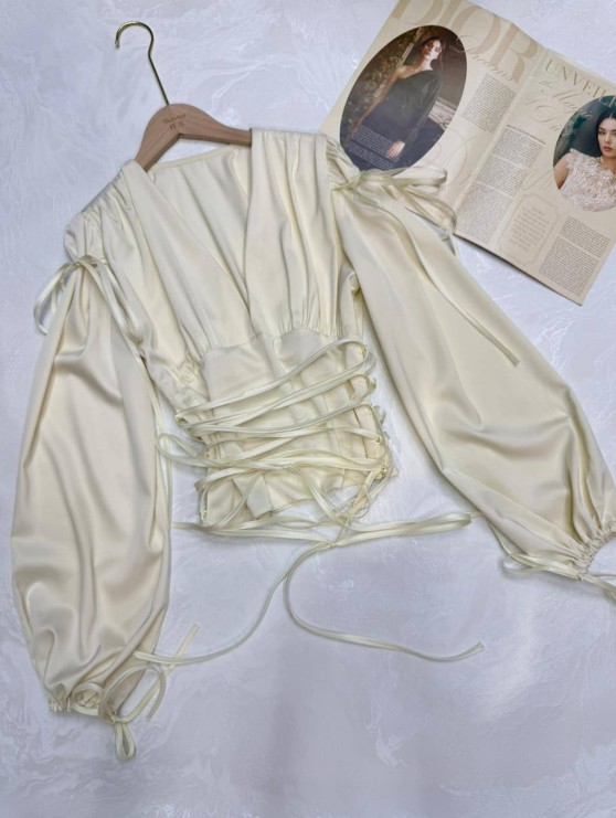 картинка Блузка на завязках от магазина Одежда+