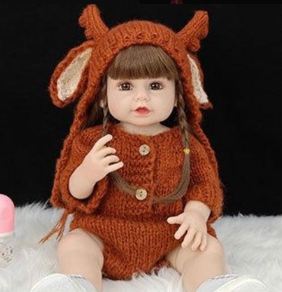 картинка Кукла-реборн в комбинезоне 60см от магазина Одежда+